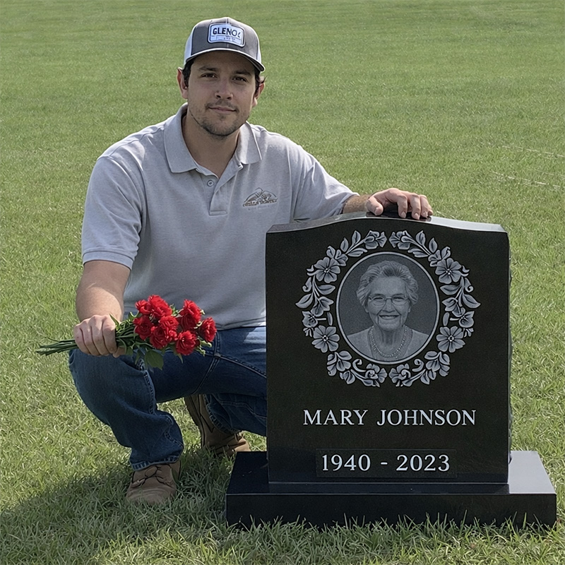 Upright headstone with portrait engraving - black granite memorial with base